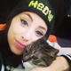 Image for article titled Rappers And Cats: A Complete History